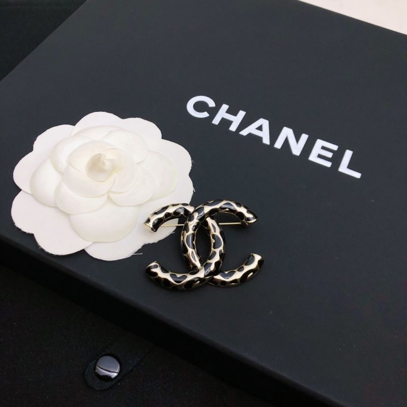 Ch*el brooches